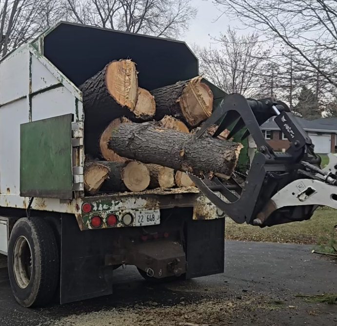Large log disposal and chip truck Freeport IL